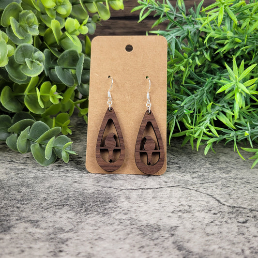 Lightweight walnut wood earrings with bird silhouette design on sterling silver-plated ear wires – front view