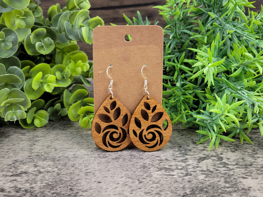 Laser-cut rose teardrop dangle earrings made of birch wood on silver-plated hooks – front view