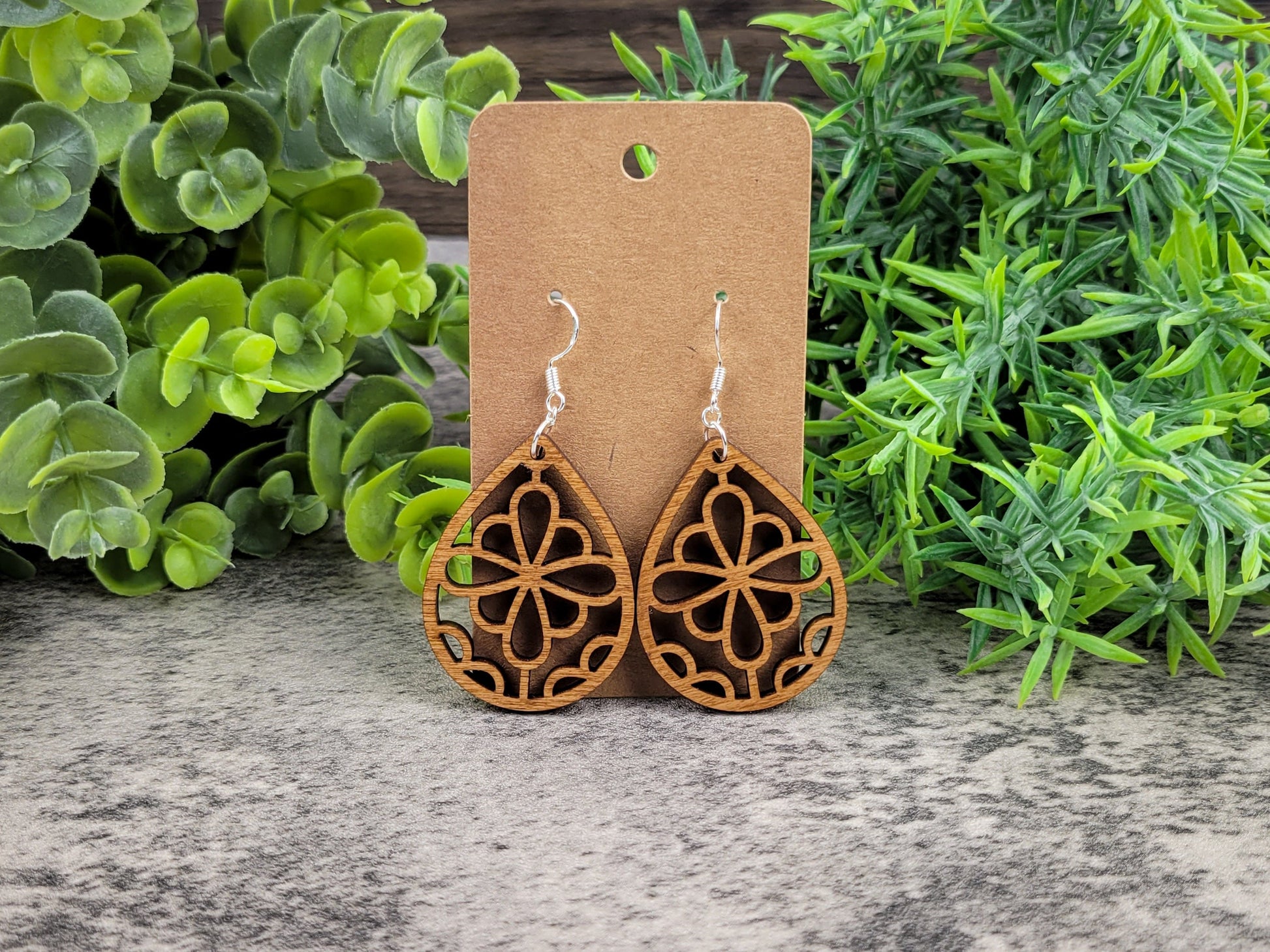Laser-cut wooden summer flower teardrop earrings with silver ear wires – front view