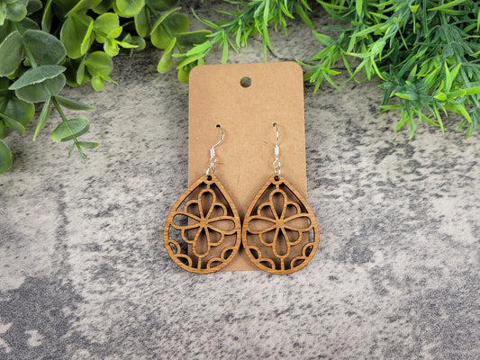 Laser-cut wooden summer flower teardrop earrings with silver ear wires – lay flat view