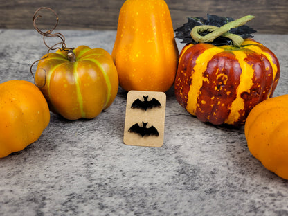Halloween jewelry collection with bat earrings front view